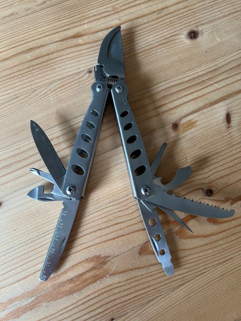 Multitool zakmes met tang RVS 9-delig, Caravans en Kamperen, Kampeergereedschap, Ophalen of Verzenden, Zo goed als nieuw