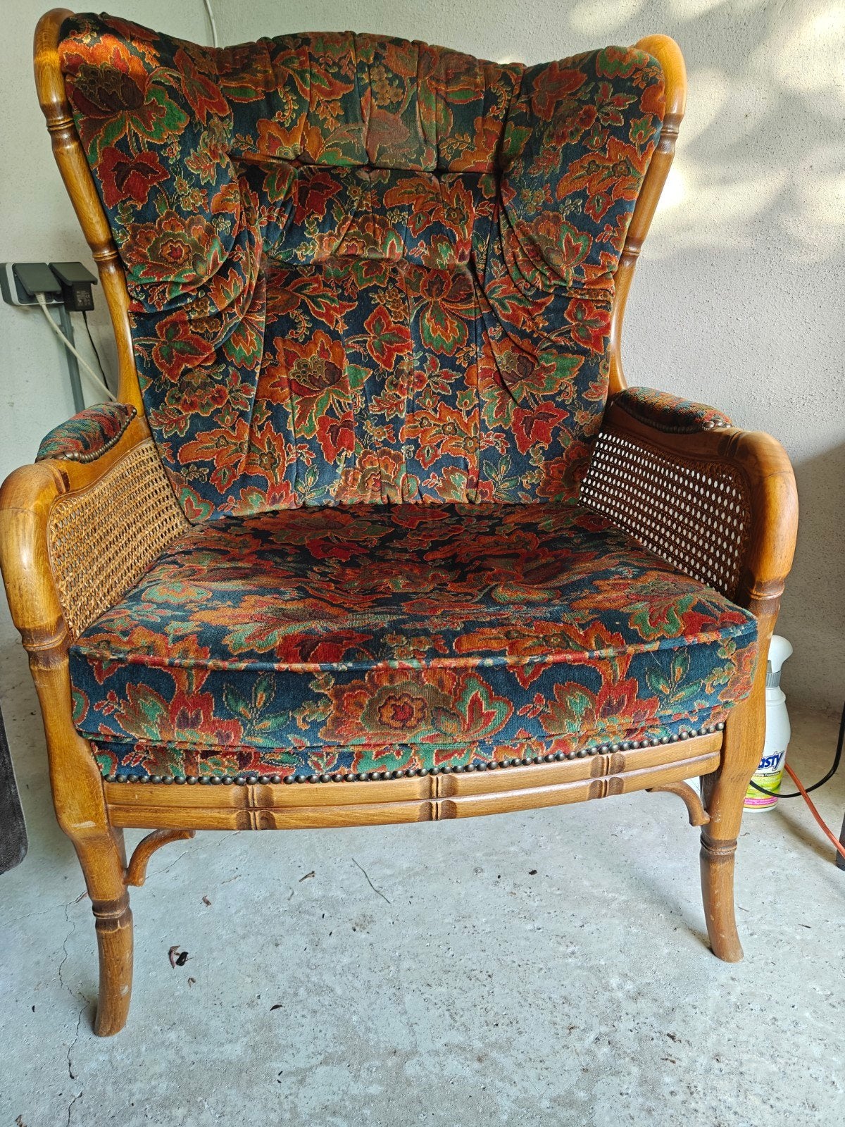 Vintage fauteuil met rotan en bloemenprint, Ophalen of Verzenden