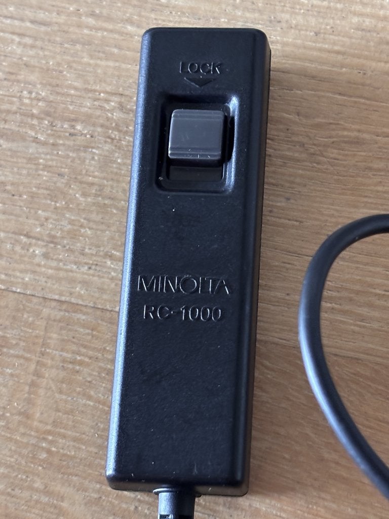 Konica Minolta draadontspanner, Ophalen of Verzenden, Gebruikt