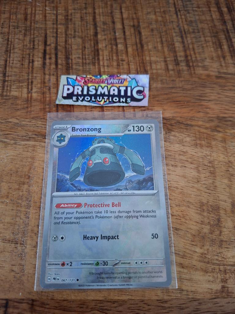 Pokemon – Bronzong (xPRE 067/131) – Prismatic, Ophalen of Verzenden, Nieuw, Losse kaart, Foil