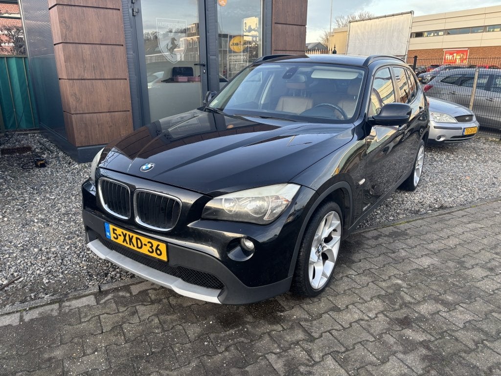 BMW X1 sDrive18i Exec. (bj 2010), Auto's, BMW, X1, Euro 5, 4 cilinders, Zwart