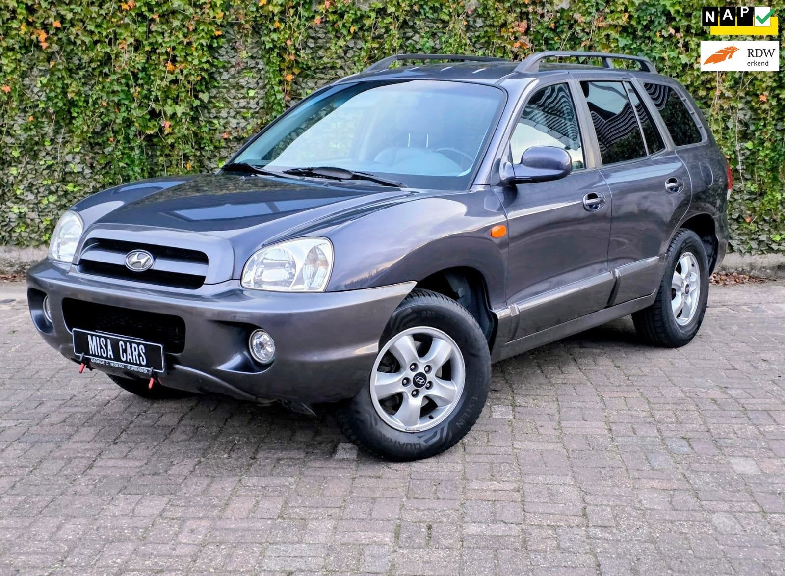 Hyundai Santa Fe 2.7i V6 4WD Style Automaat Trekhaak Airco N, Auto's, Automaat, Santa Fe, Gebruikt, Zwart