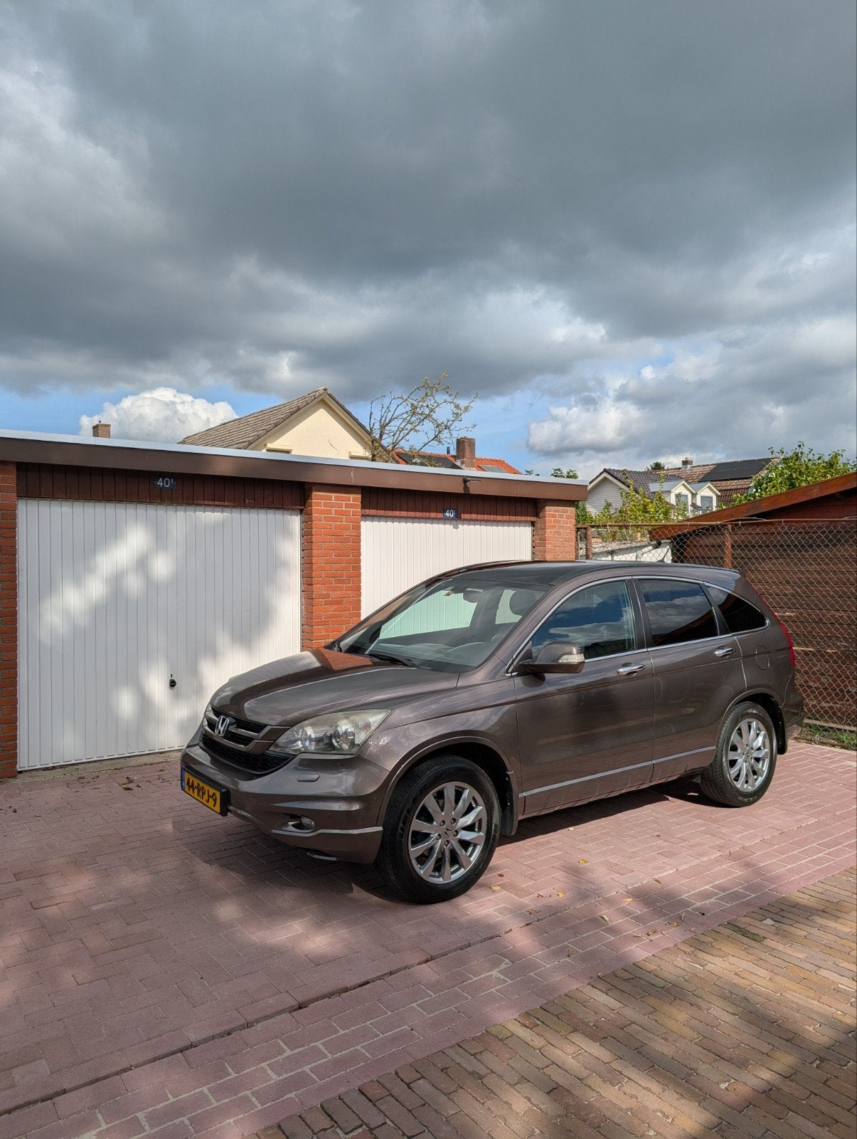 Honda CR-V 2.0i Aut. Executive 2011, Auto's, Automaat, Dealer onderhouden, 4 cilinders, Bruin