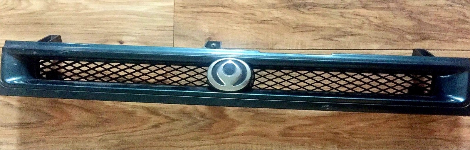 mazda 323 grill voor bw- 90 - 96  blauw, Ophalen, Voor, Nieuw, Mazda
