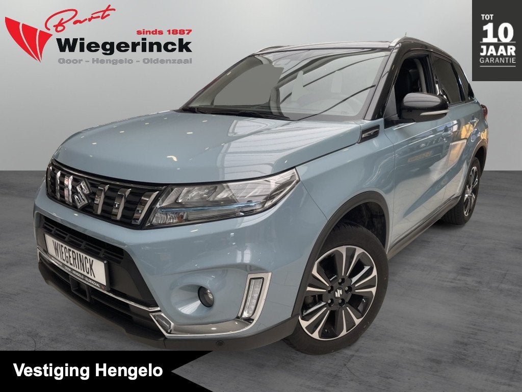 Suzuki Vitara 1.4 Style Hybrid [ 1e EIGENAAR I DEALER OH I T, Auto's, Gebruikt, 4 cilinders, Blauw, 49 €/maand