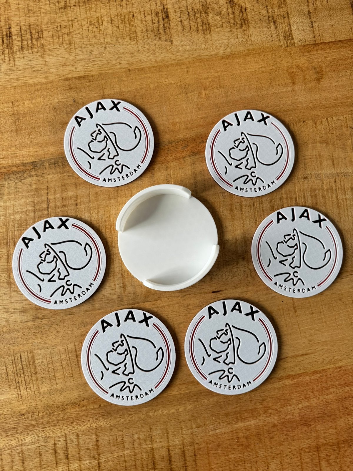 Ajax onderzetters, 4, 6 of 8 stuks inclusief houder, Glasonderzetter, Ophalen of Verzenden, Kunststof, Meerkleurig