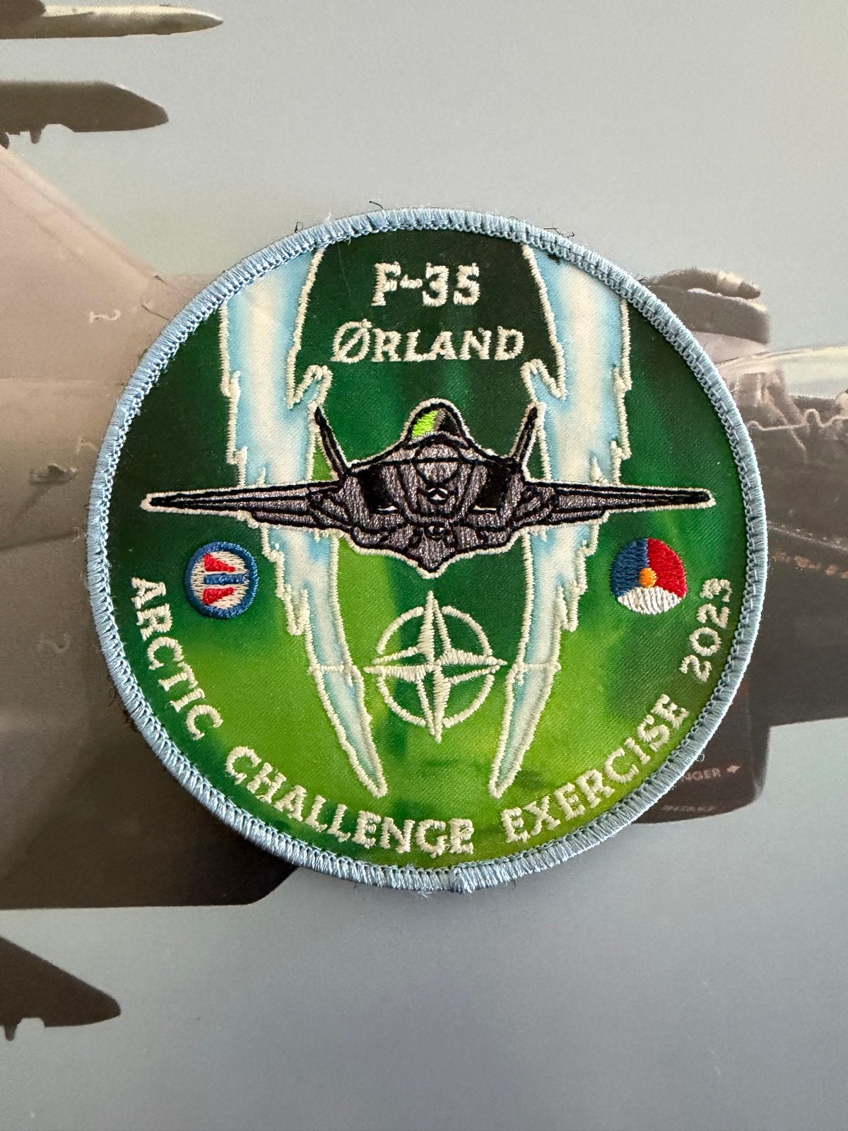 F-35 Ørland Arctic Challenge Exercise 2023 322 sqn Rnlaf, Verzamelen, Ophalen of Verzenden, Luchtmacht, Nederland, Embleem of Badge