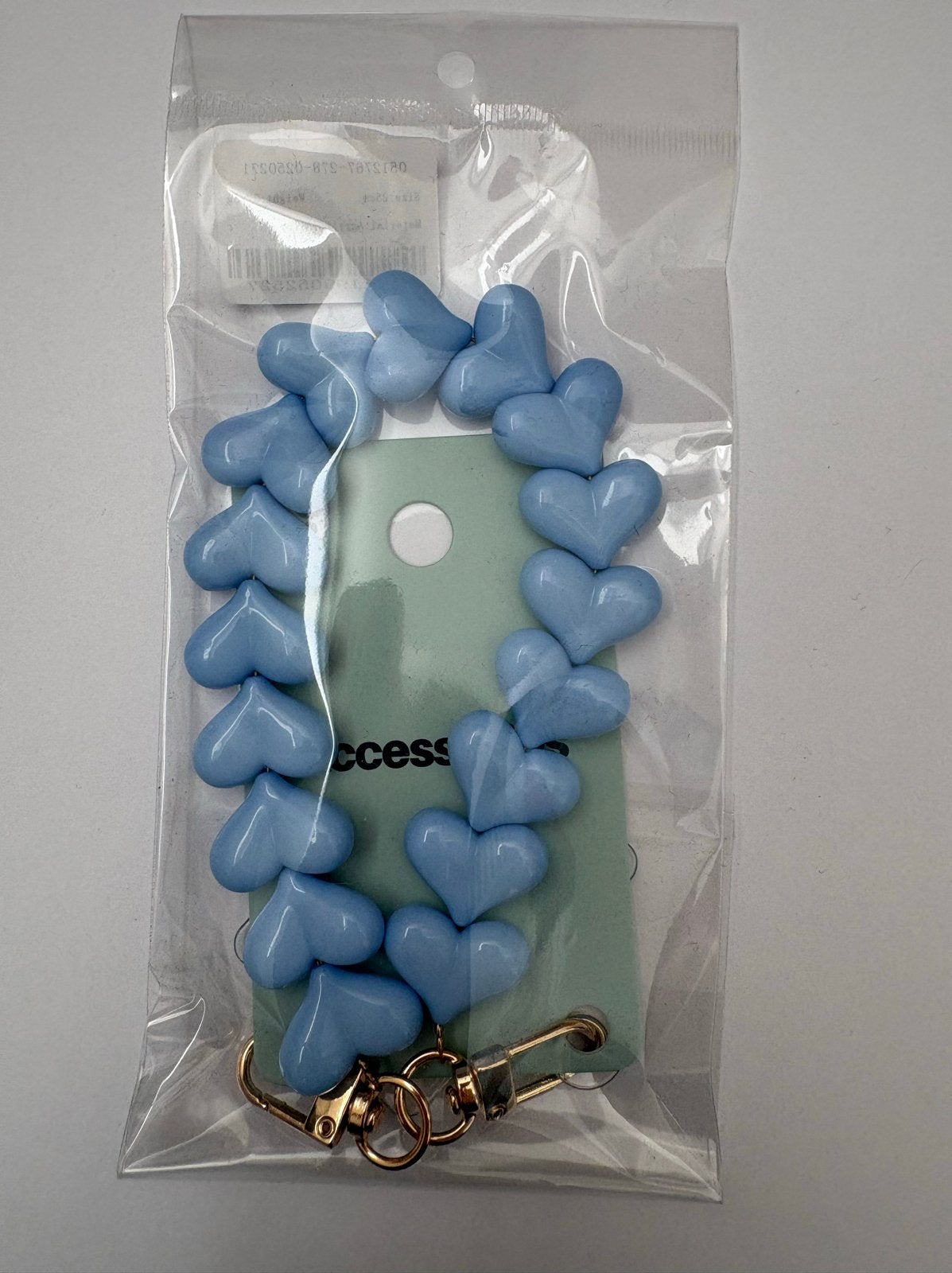Telefoon ketting koord met licht blauwe hartjes, Telecommunicatie, Ophalen of Verzenden, Nieuw, Telefoonhanger of Accessoire, Universeel