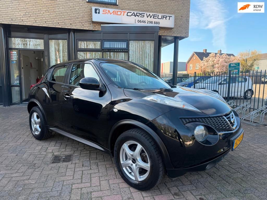 Nissan Juke 1.6 Acenta Climate Navi Cruise, Auto's, Nissan, Voorwielaandrijving, Euro 5, Stof, Zwart