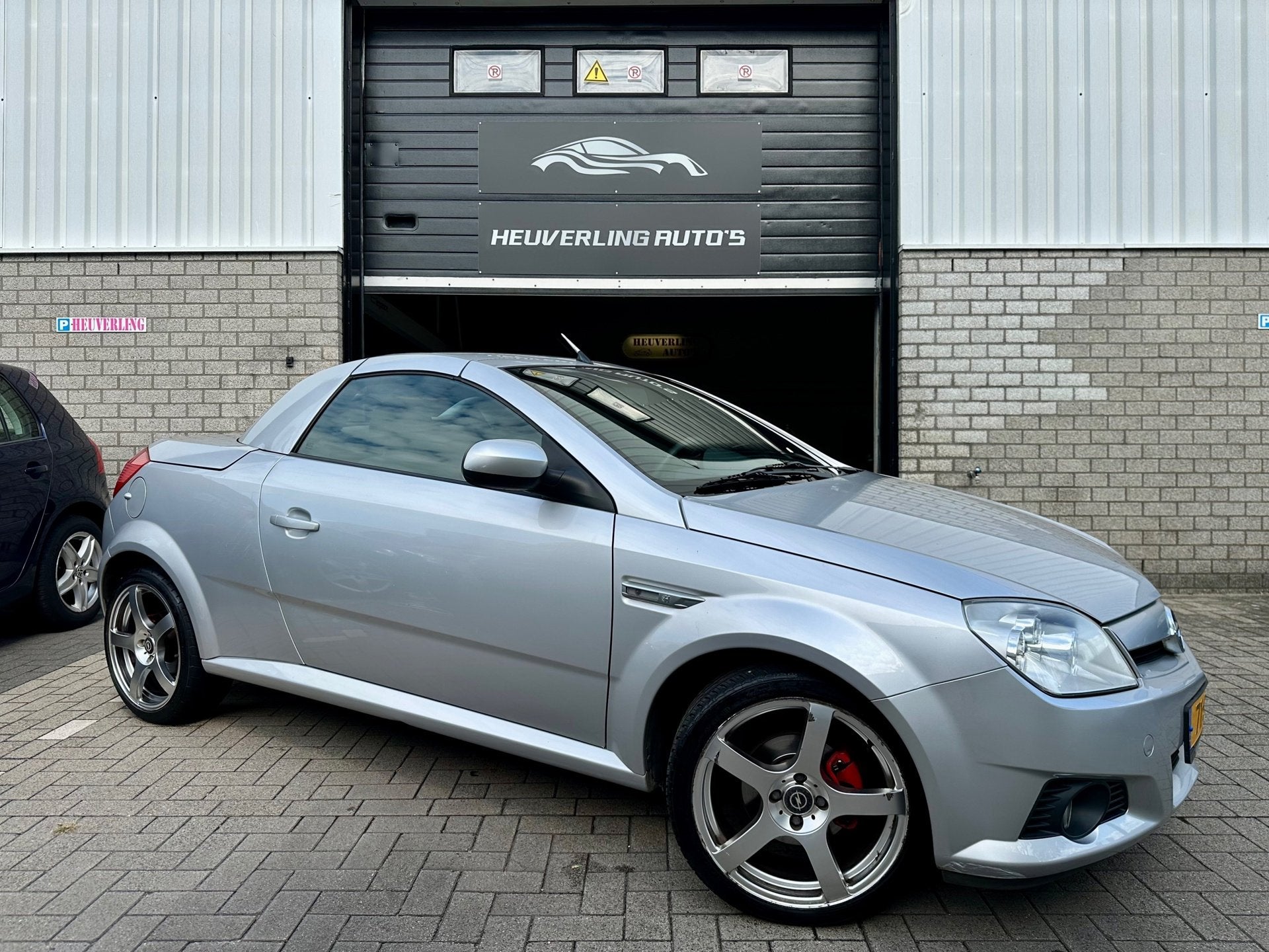 Opel Tigra TwinTop 1.8 - 16V Sport | Airco | LMV | APK, Auto's, Dealer onderhouden, Gebruikt, Zwart, 4 cilinders