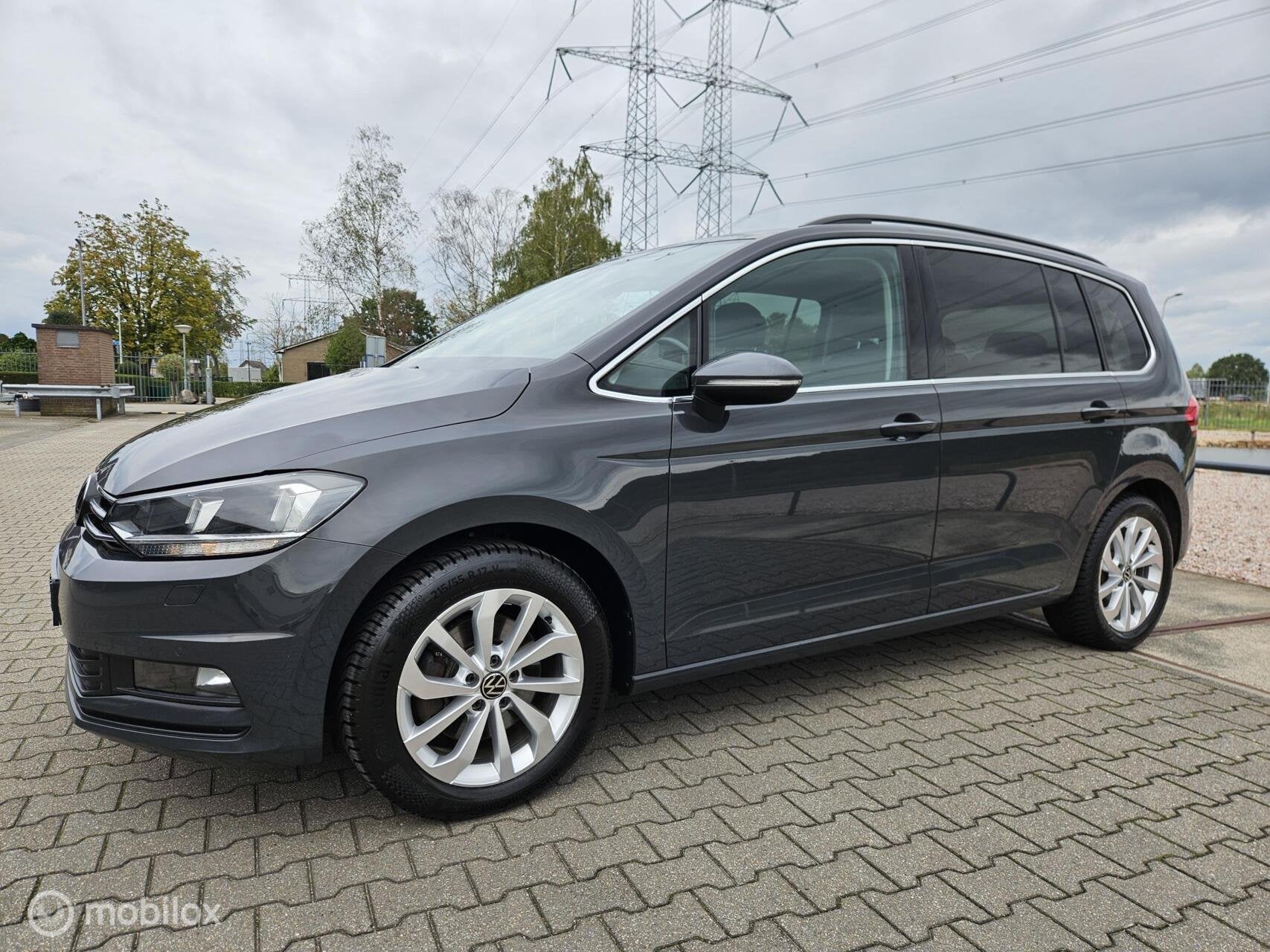 Volkswagen Touran 1.5 TSI Highline 7p/automaat/alle optie's, Auto's, 15 km/l, 4 cilinders, 150 pk, Bedrijf