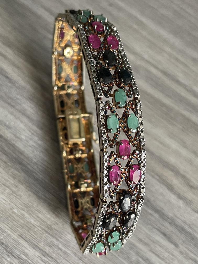 Zilveren vintage armband met smaragd,saffier,en robijnen