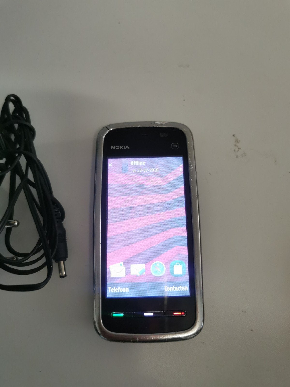 Nokia C6-00 met lader - Gebruikt, Gebruikt, Schuifmodel, 3 tot 6 megapixel, Ophalen of Verzenden