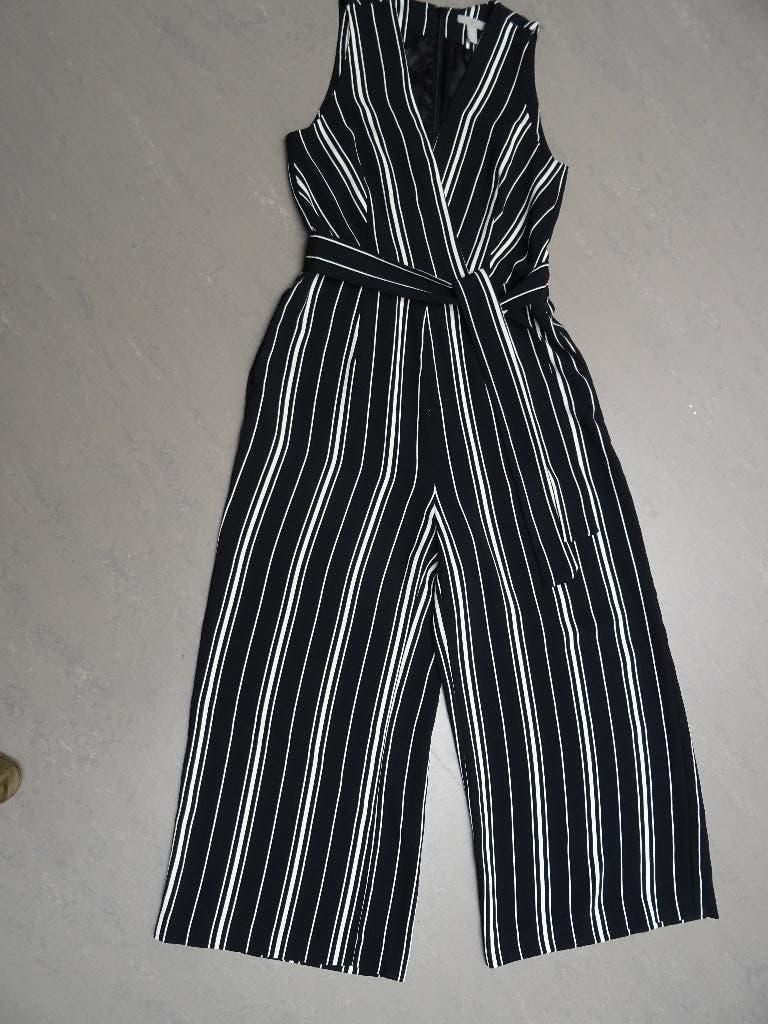 H & M maat 38, zwart-wit jumpsuit., Maat 38/40 (M), Zwart, Ophalen of Verzenden, Zo goed als nieuw