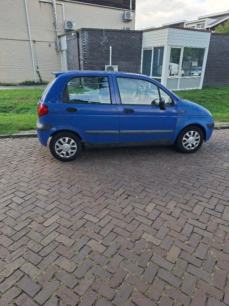 Daewoo Matiz 1.0 2004 Blauw(opknapper), Auto's, Daewoo, Voorwielaandrijving, Dealer onderhouden, 15 km/l, 64 pk