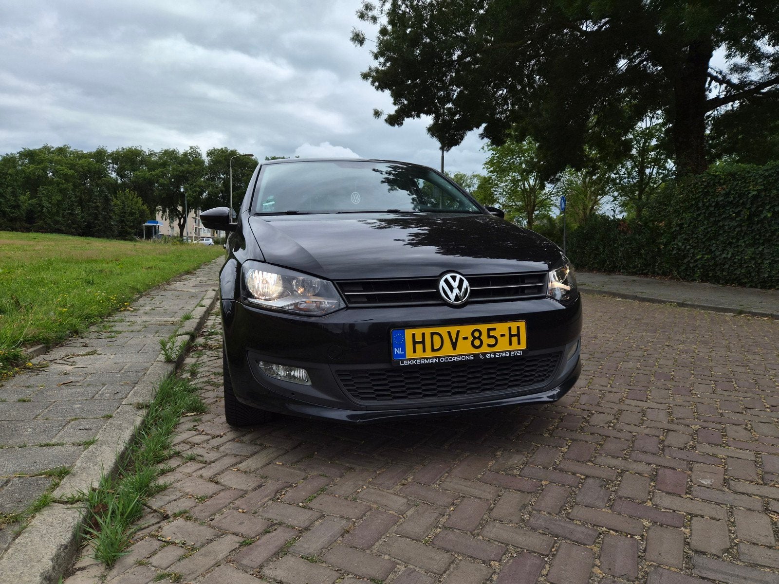 Volkswagen Polo 1.2 TSI 77KW 2010 Zwart, Auto's, Volkswagen, Voorwielaandrijving, Zwart, 988 kg, 1200 kg