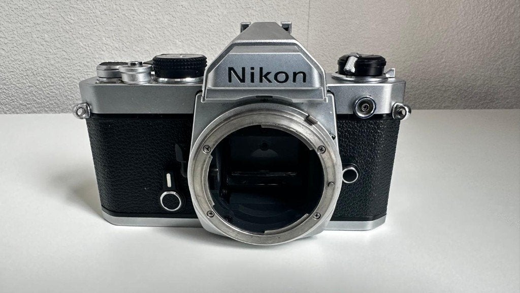 Klassieke Nikon FM 35mm Analoge Filmcamera – Body Only, Audio, Tv en Foto, Ophalen of Verzenden, Gebruikt, Spiegelreflex, Nikon