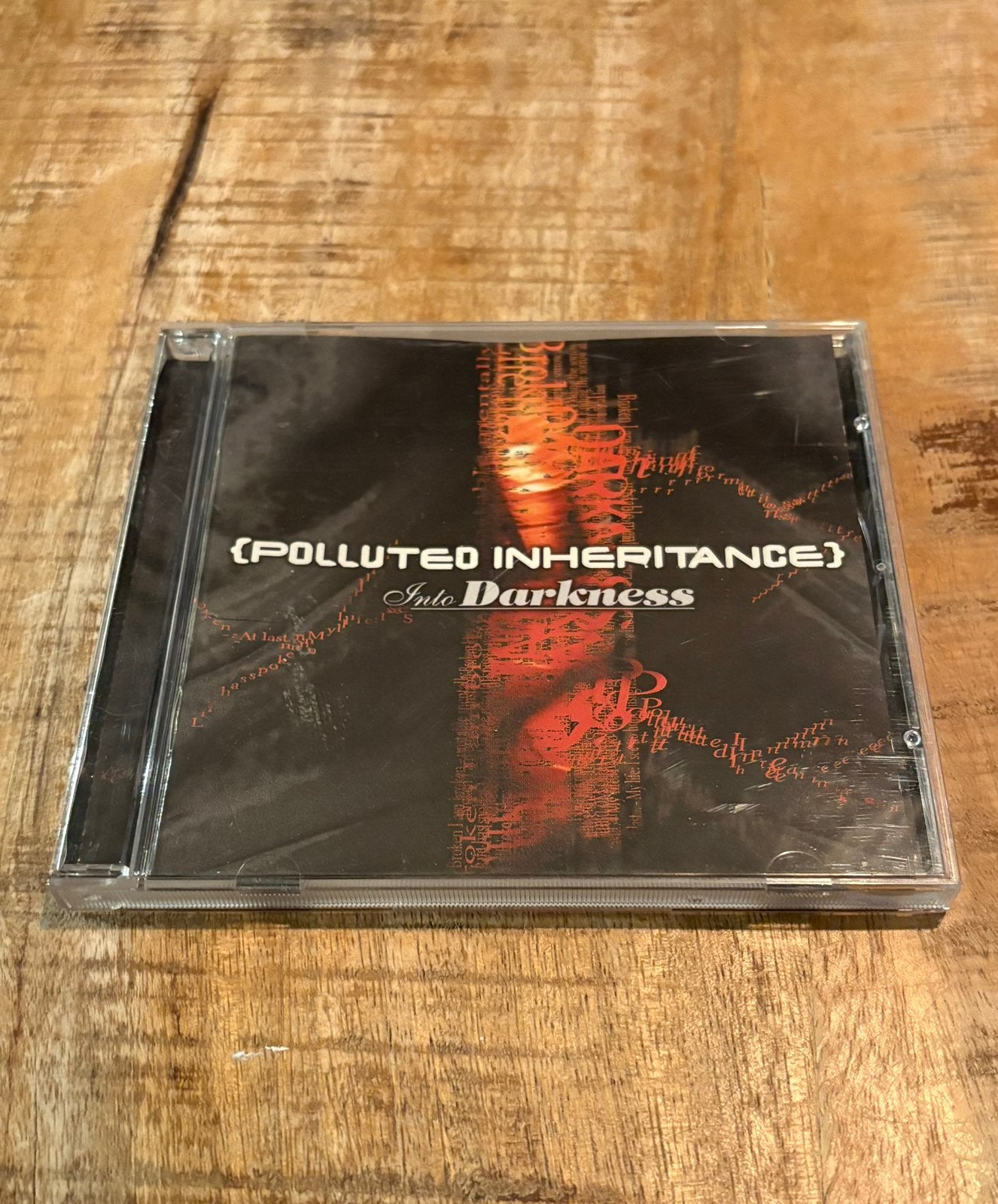 Polluted Inhertitance - Into Darkness, Ophalen of Verzenden, Zo goed als nieuw