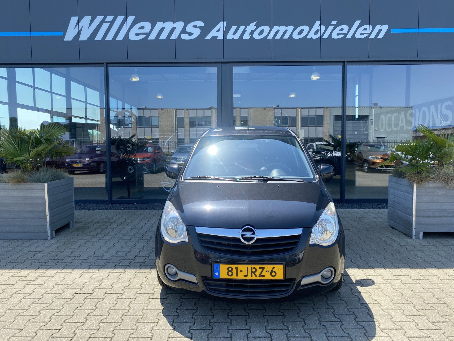 Opel Agila 1.2 Enjoy Airco (bj 2009), Auto's, Opel, Voorwielaandrijving, Zwart, Origineel Nederlands, Bedrijf