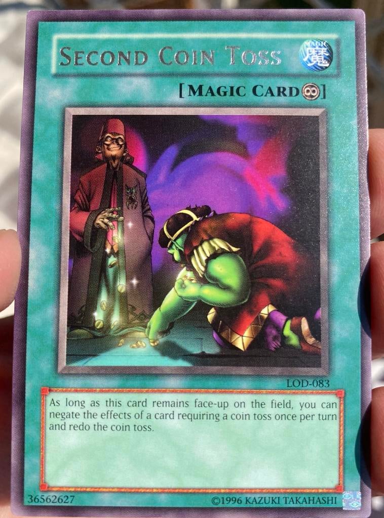 Yu-Gi-Oh! Second Coin Toss LOD Old US Magic Rare !, Ophalen of Verzenden, Gebruikt, Losse kaart
