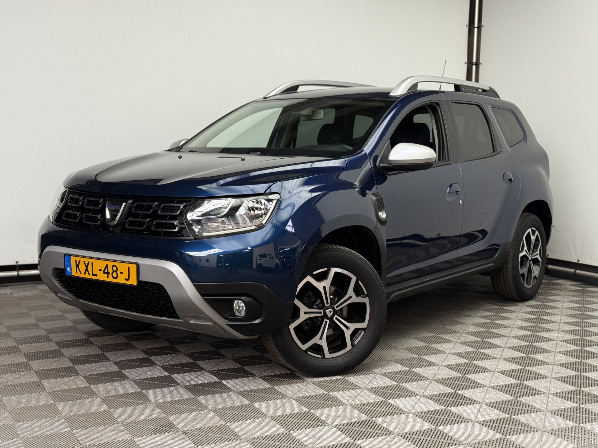 Dacia Duster 1.2 TCe Prestige 360 Camera LM17" Navi, Auto's, Voorwielaandrijving, Gebruikt, 4 cilinders, Leder