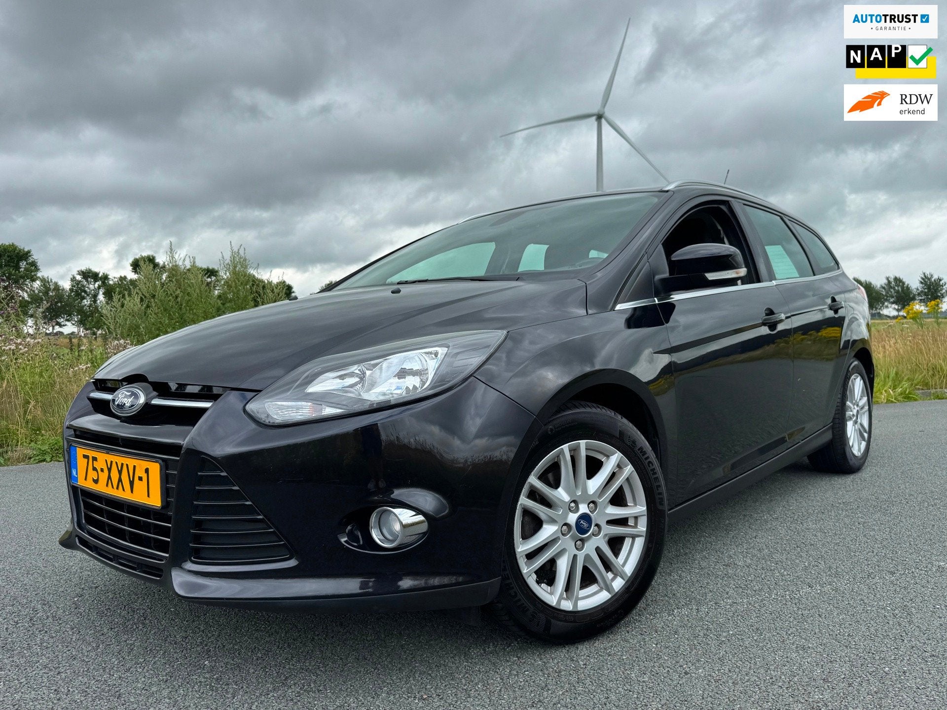 Ford Focus Wagon 1.0 EcoBoost Titanium Navi Cruise Clima NAP, Euro 5, 125 pk, Gebruikt, Zwart