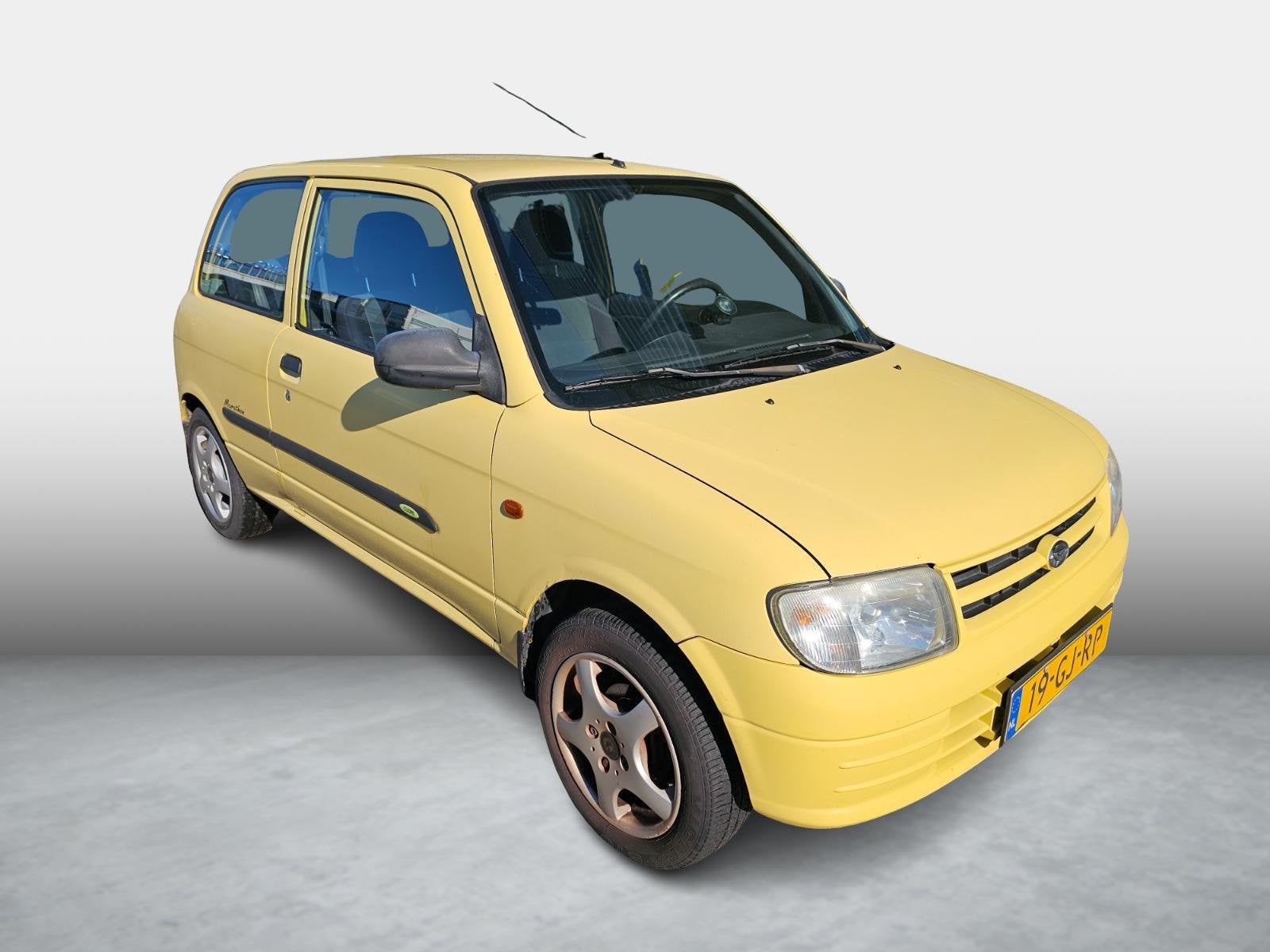 Daihatsu Cuore 1.0-12V XTi, Voorwielaandrijving, Stof, 18 €/maand, 4 stoelen