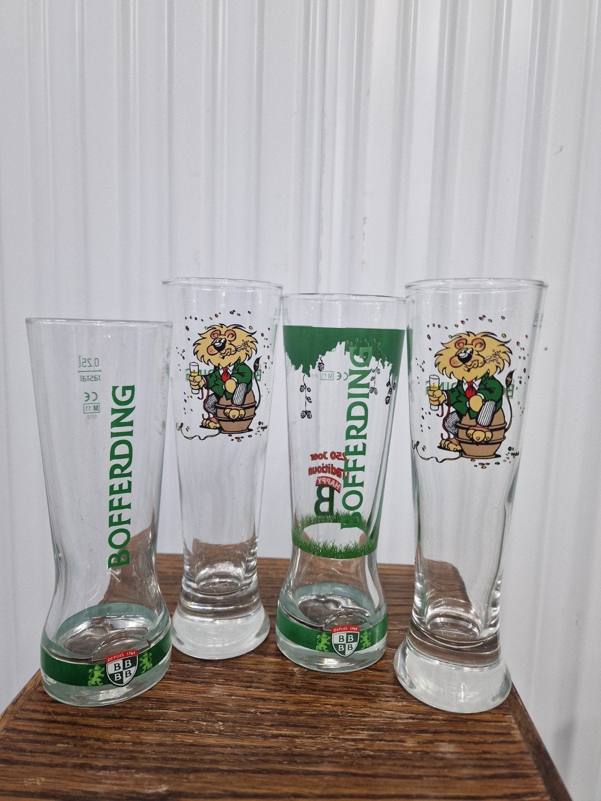 4x beer glazen leuw bofferding, Ophalen of Verzenden, Zo goed als nieuw, Glas of Glazen, Overige merken