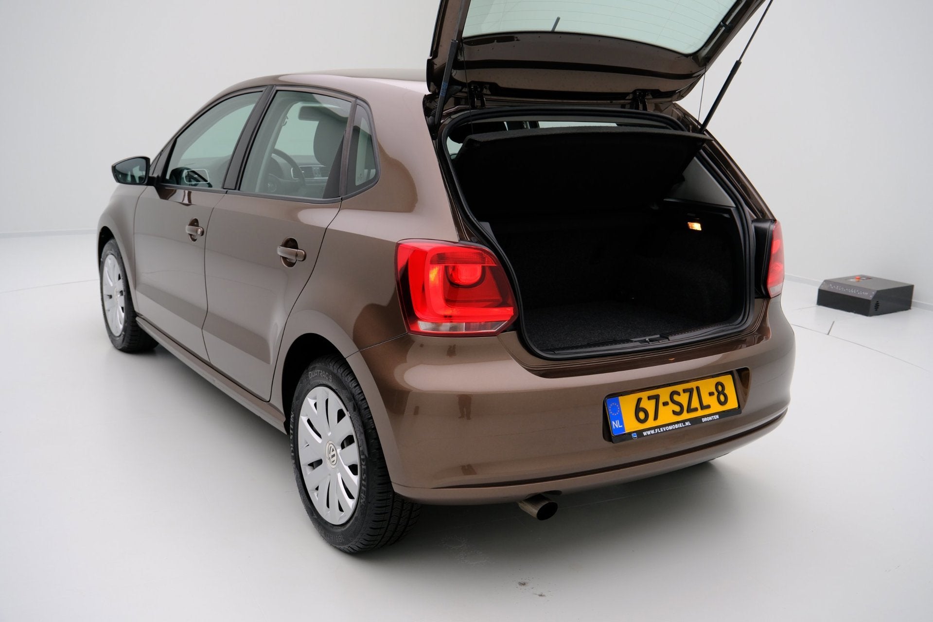 Foto 8 van Volkswagen Polo 1.2 TSI Comfortline 5-drs *63.000km!* Airco|