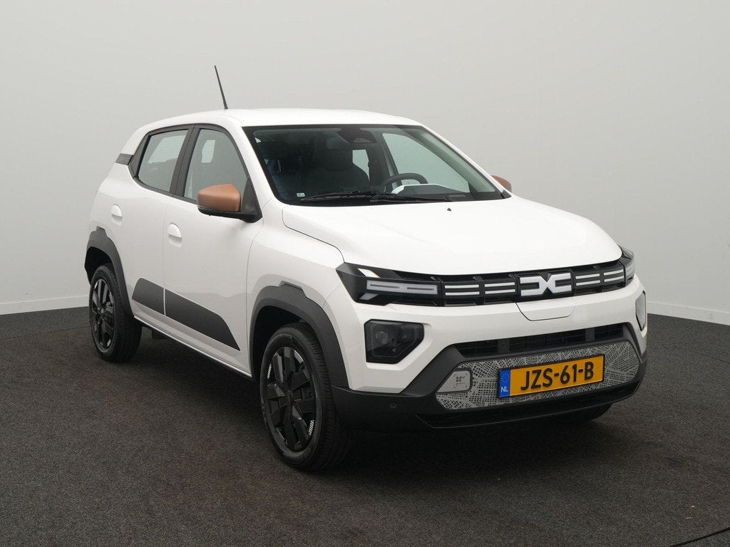 Dacia Spring Extreme 65 26.8 kWh - Demo - DC Lader - Noodlaa, Auto's, Dacia, Stof, Gebruikt, Zwart, 38 min