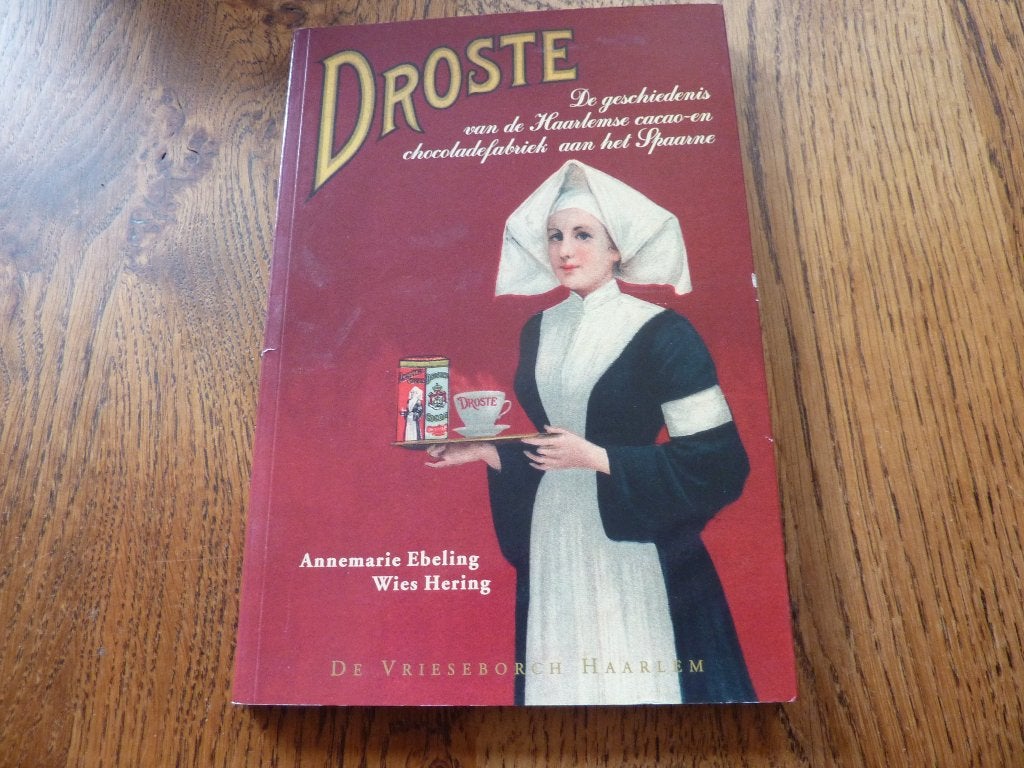 Droste: Geschiedenis van de Haarlemse cacaofabriek, Boeken, 20e eeuw of later, Ophalen of Verzenden, Zo goed als nieuw, Annemarie Ebeling, Wies Hering