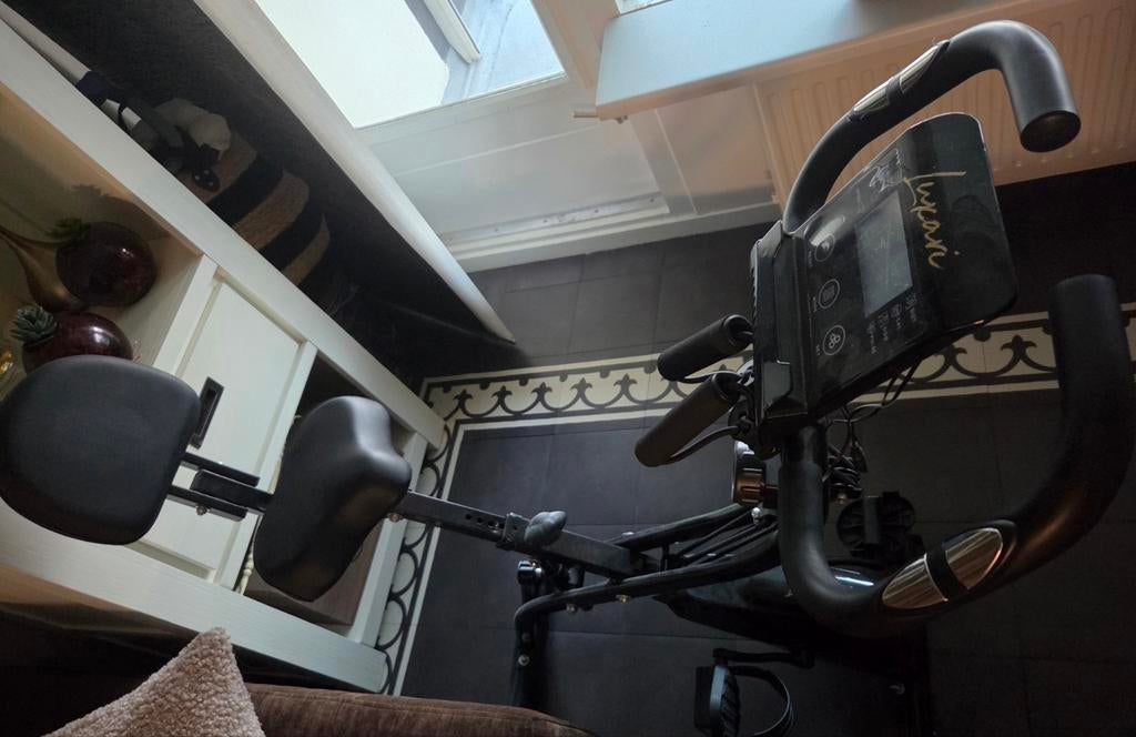 Hometrainer Luxari zo goed als nieuw met boekje alleen ophal, Ophalen of Verzenden