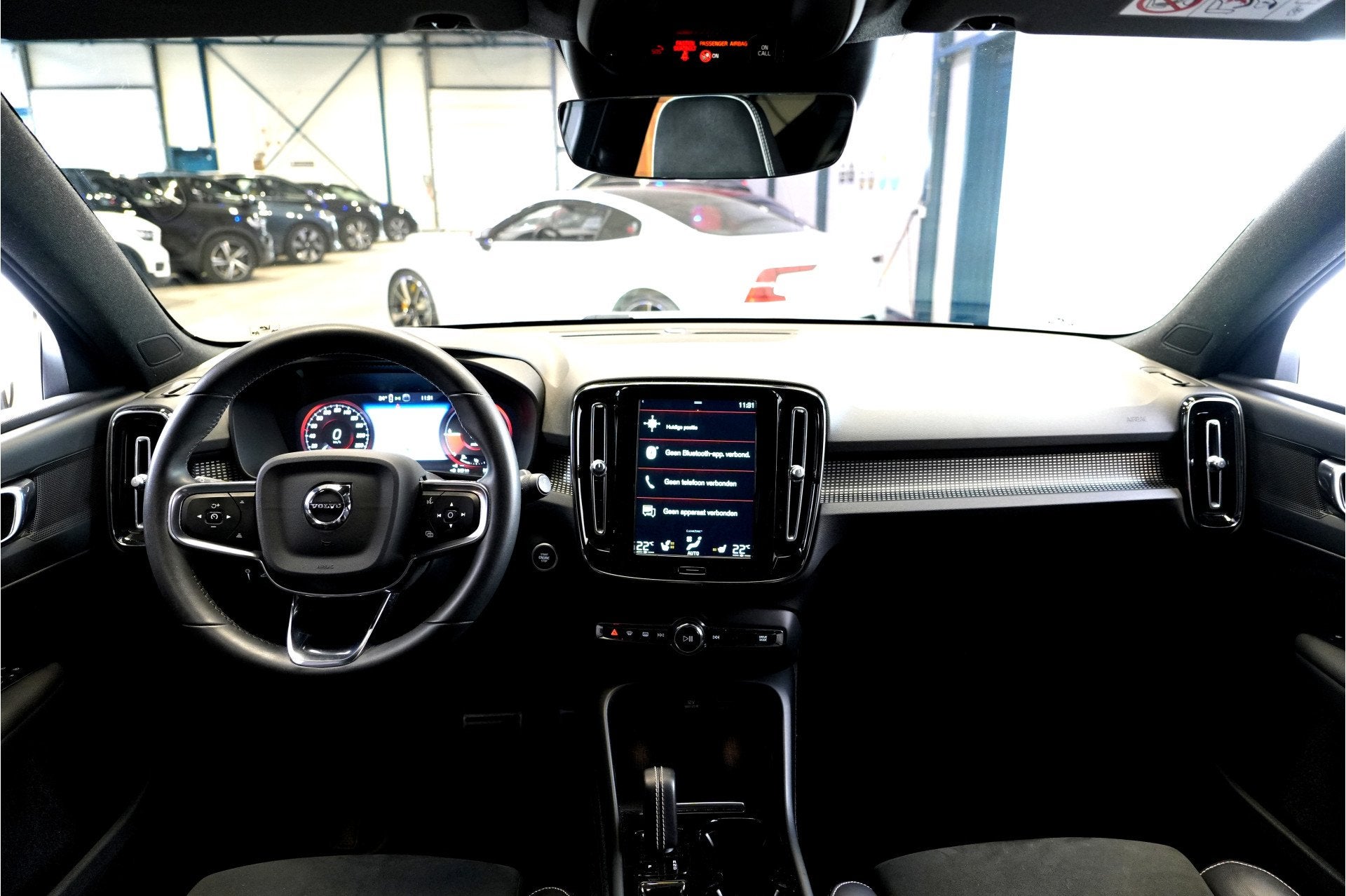 Volvo XC40 1.5 T4 Recharge 155kW/211pk DCT7 R-Design LEER/AL, Auto's, Volvo, Dealer onderhouden, Met garantie (alle), Hybride Elektrisch/Benzine