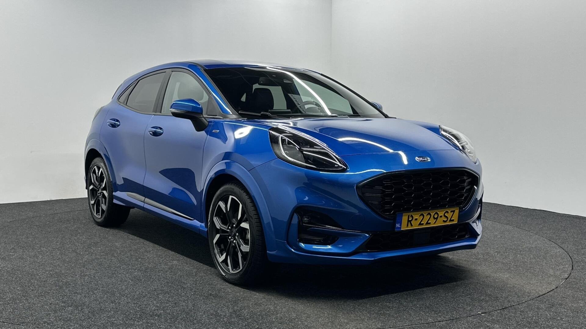 Ford Puma 1.0 EcoBoost Hybrid ST-Line X TREKHAAK CARPLAY NAV, Auto's, Ford, Voorwielaandrijving, Met garantie (alle), Blauw, Leder en Stof