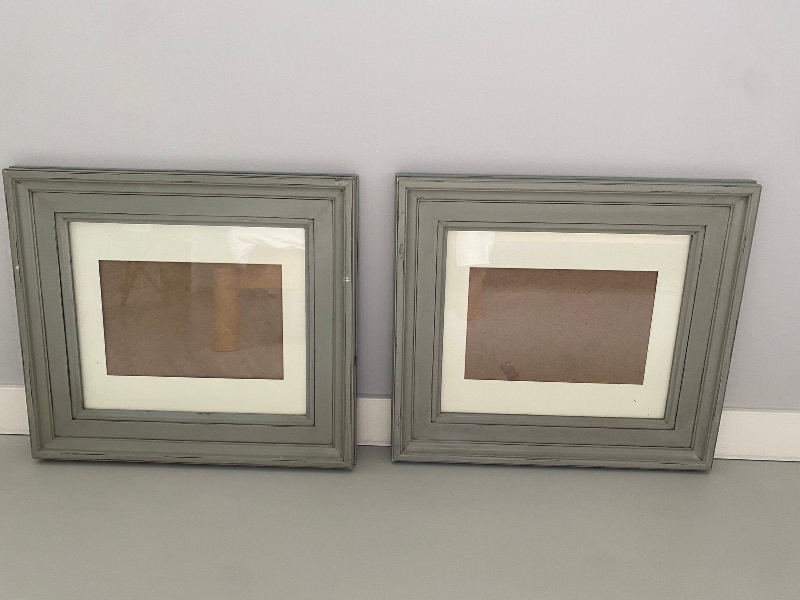 2 fotolijsten Riviera Maison grijs, Huis en Inrichting, Woonaccessoires | Lijsten, Ophalen, Gebruikt, 46 cm, 52 cm