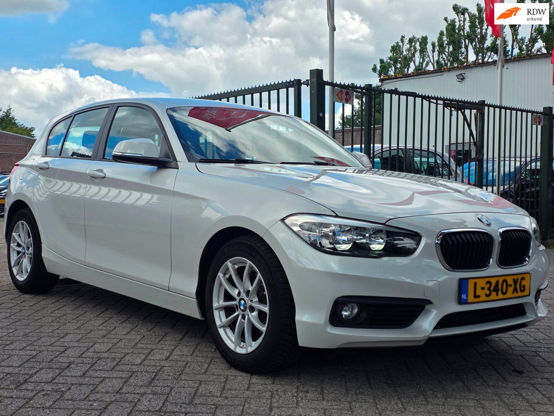 BMW 1-serie 118i Corporate Lease Executive Paramuur Automaat, Gebruikt, Wit, Bedrijf, 650 kg
