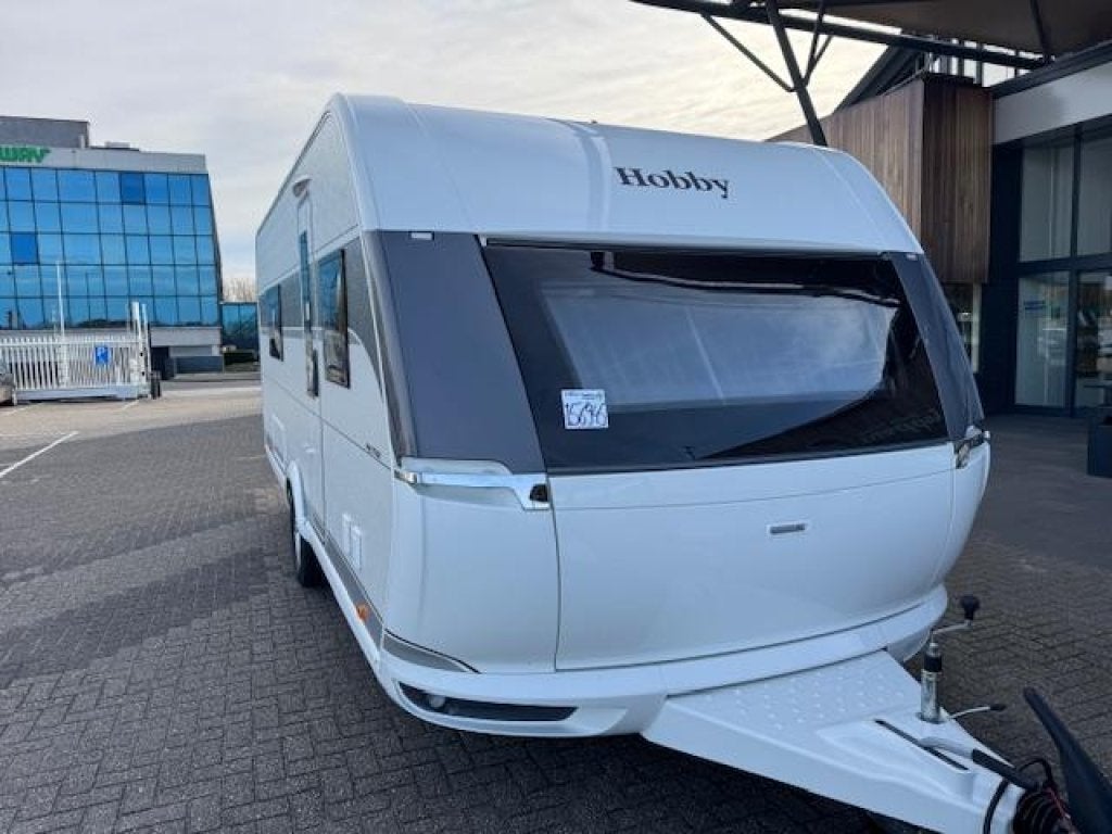 Hobby Prestige 560 WLU 2026 MEGA KORTING € 3617,-!!, Caravans en Kamperen, Standaardzit, Hobby, 2 aparte bedden, Bedrijf