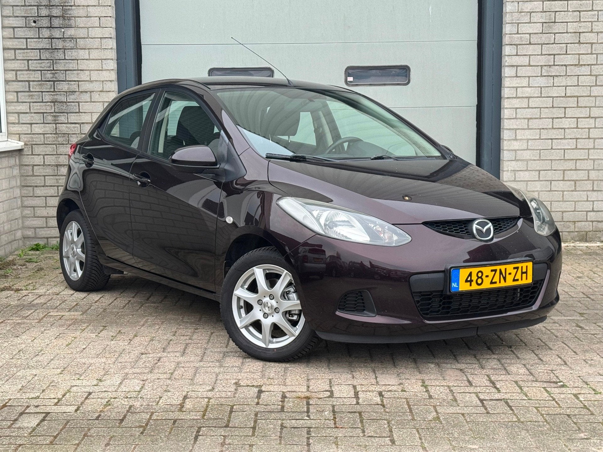 Mazda 2 1.3hp S-VT Touring Airco|Nap, Auto's, Voorwielaandrijving, Gebruikt, 31 €/maand, 4 cilinders
