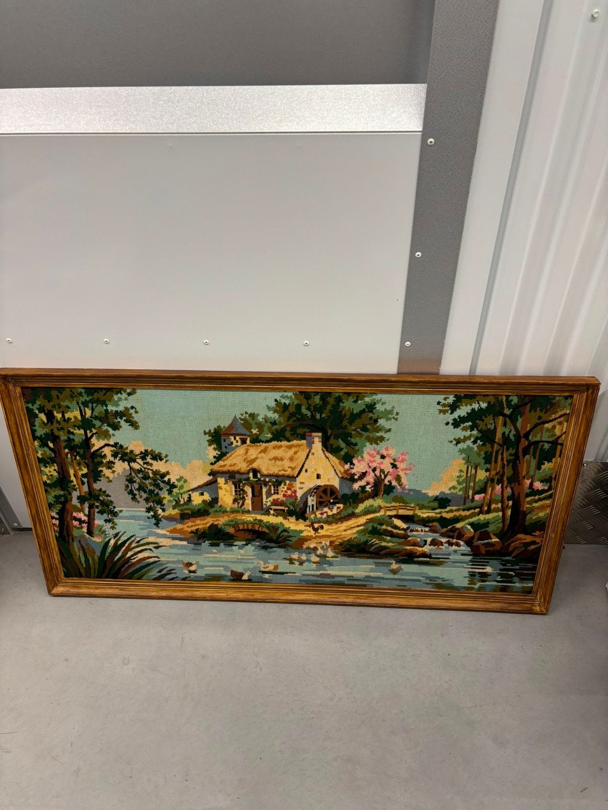 Needlepoint schilderij, Ophalen