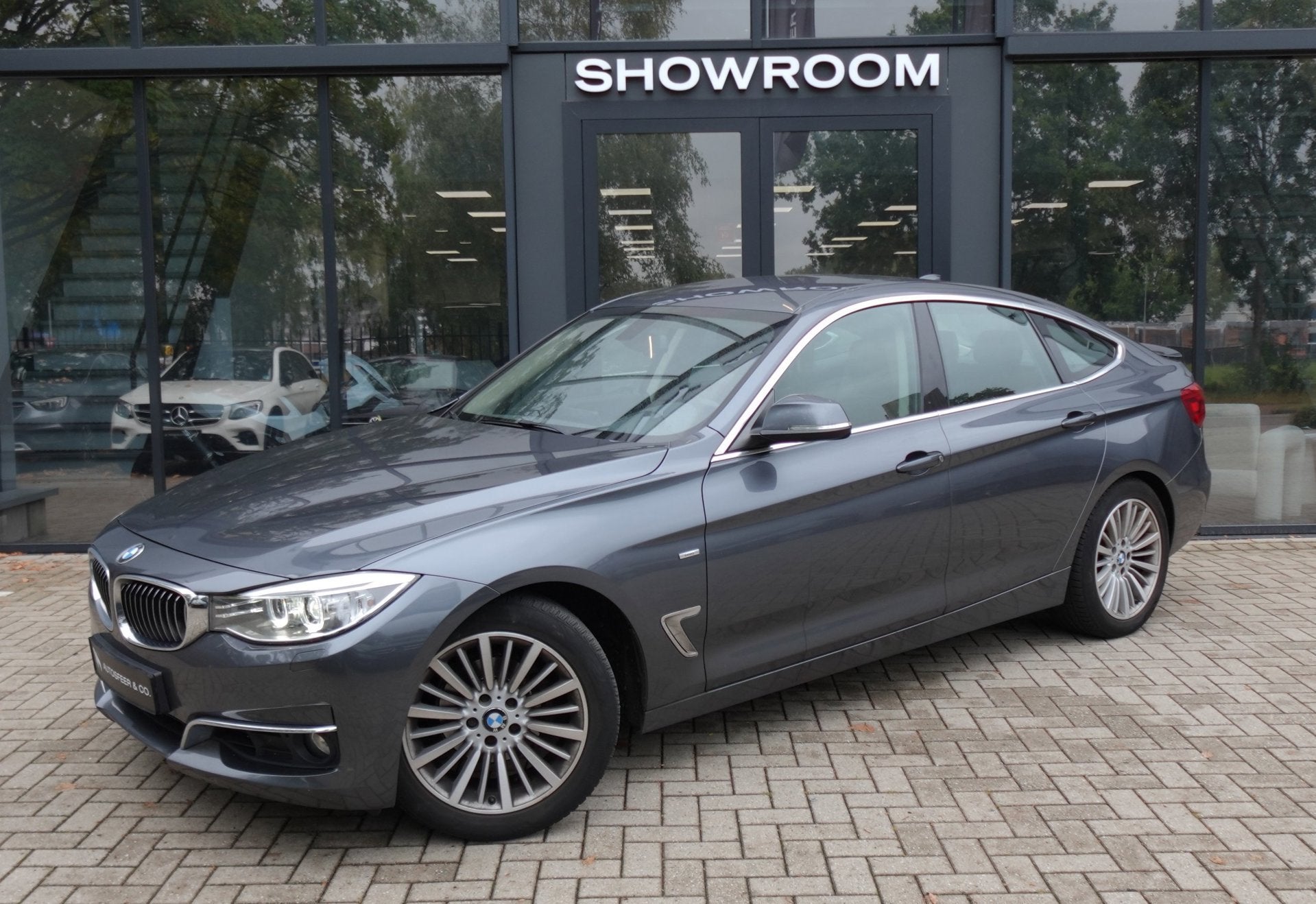 BMW 3-serie Gran Turismo 320i High Executive NAVI LEDER PCD, Auto's, BMW, Automaat, Achterwielaandrijving, Gebruikt, Euro 6