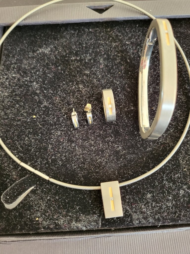 Unieke titanium sieraden set met briljantjes, Overige materialen, Ophalen of Verzenden, Zo goed als nieuw, Met edelsteen