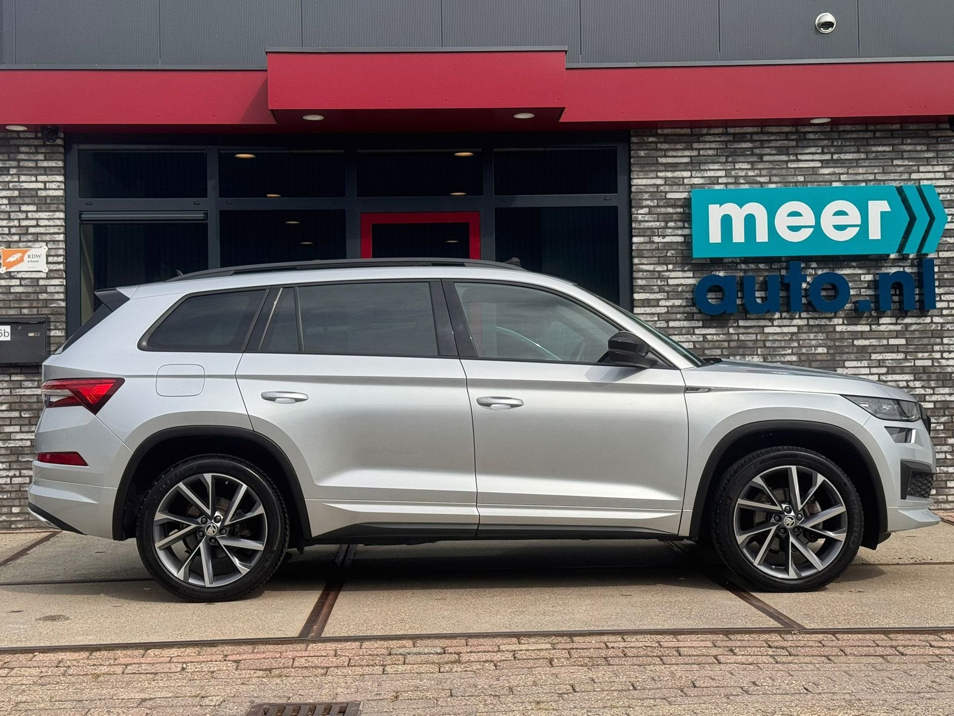 Skoda Kodiaq 1.5 TSI Sportline DSG 7-pers PANO l CAMERA l TR, Auto's, Dealer onderhouden, 1566 kg, Euro 6, 4 cilinders