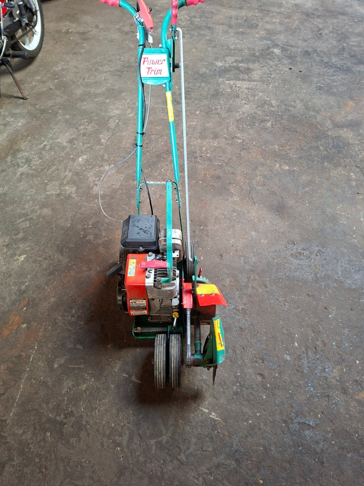 Power trim graskantensnijder, Ophalen