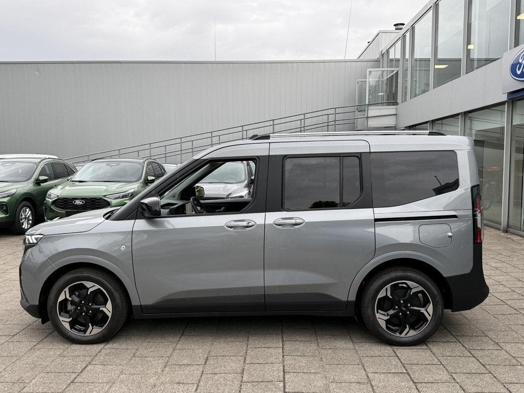 Ford Tourneo courier Tourneo Courier BEV 43kWh Trekhaak - Wi, Auto's, Gebruikt, 750 kg, Origineel Nederlands, Zilver of Grijs