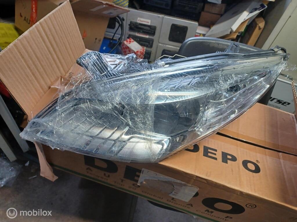 Koplamp links Renault Megane Coupé III   4377961 260605985R, Auto-onderdelen, Renault, Nieuw, Ophalen of Verzenden, Renault