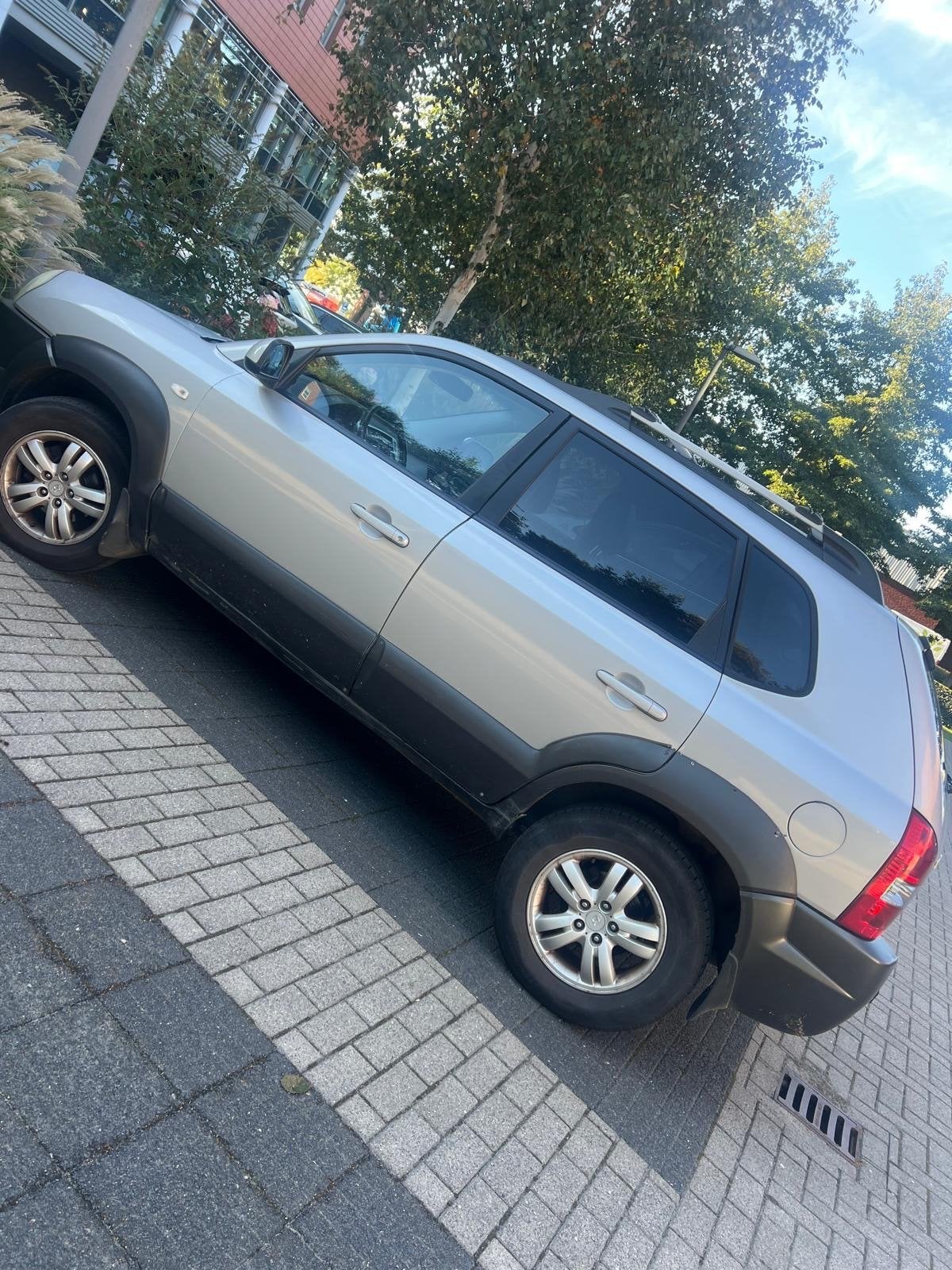 Hyundai Tucson 2.0 I 2WD 2007 Grijs, Auto's, 4 cilinders, Origineel Nederlands, 75 €/maand, Handgeschakeld