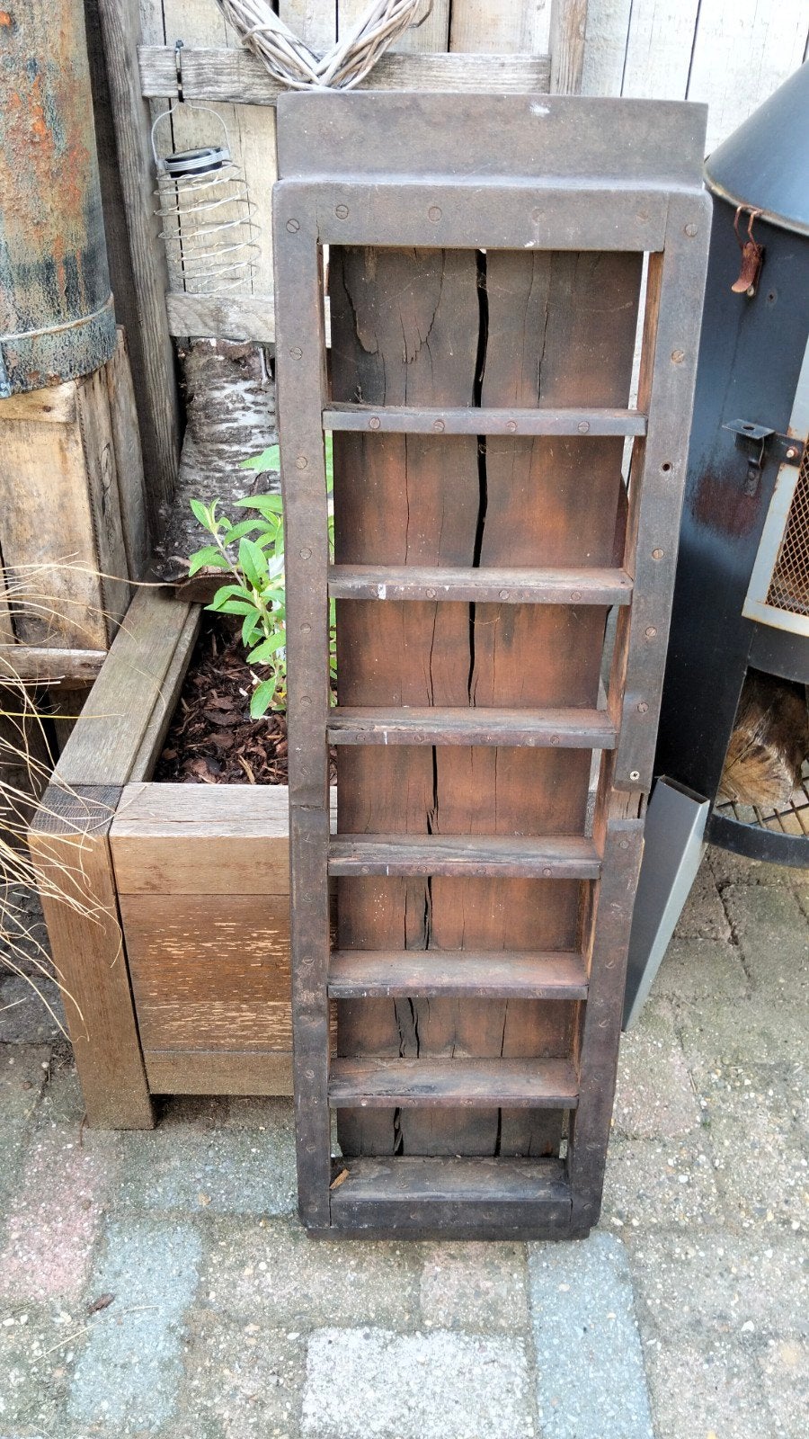 Grote brocante steenmal afgewerkt met ijzer heel zwaar, Ophalen