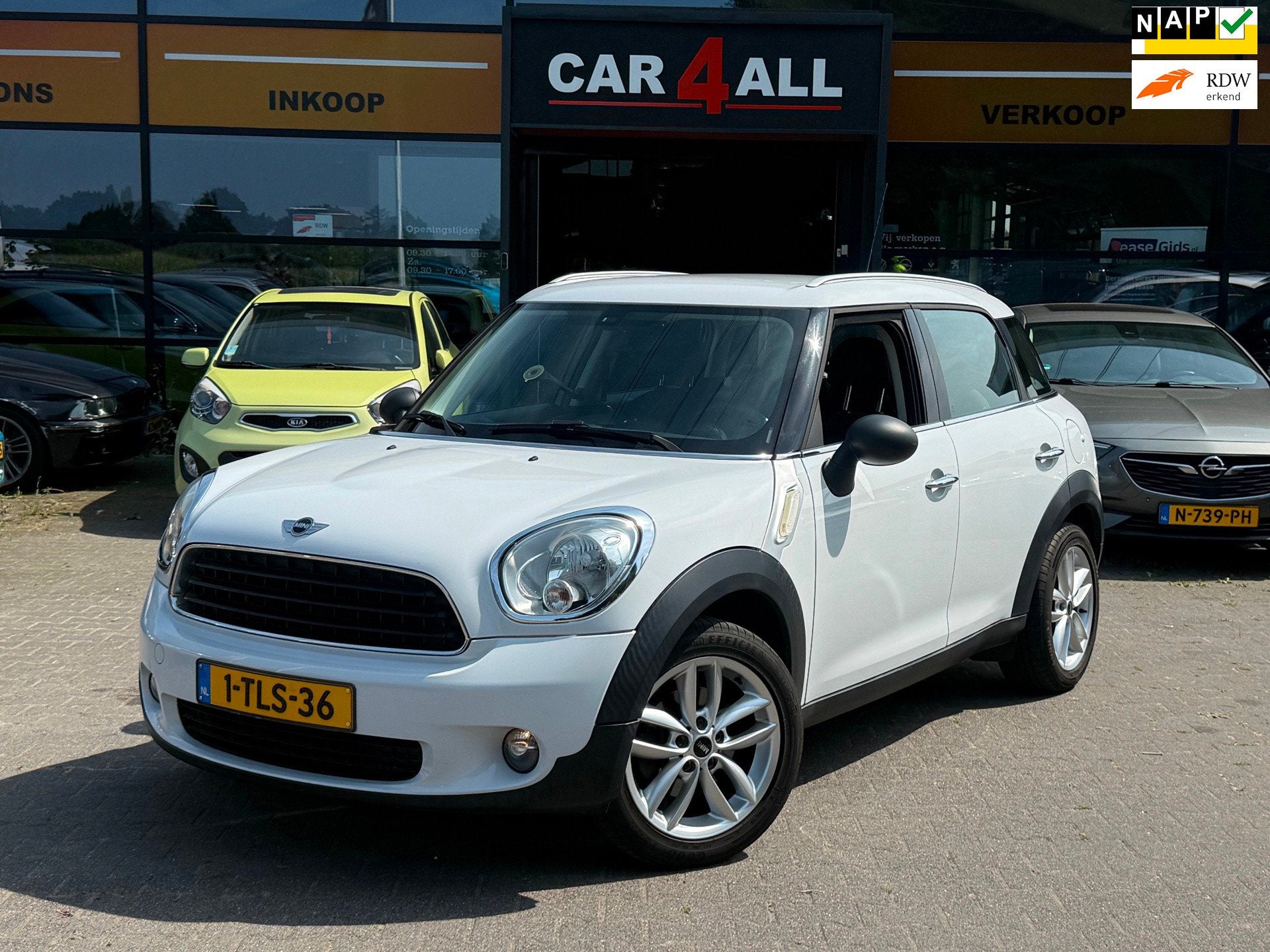Mini Countryman 1.6 One Holland Street NAVI/PDC/CRUISE/AIRCO, Auto's, Voorwielaandrijving, Gebruikt, Leder en Stof, Wit