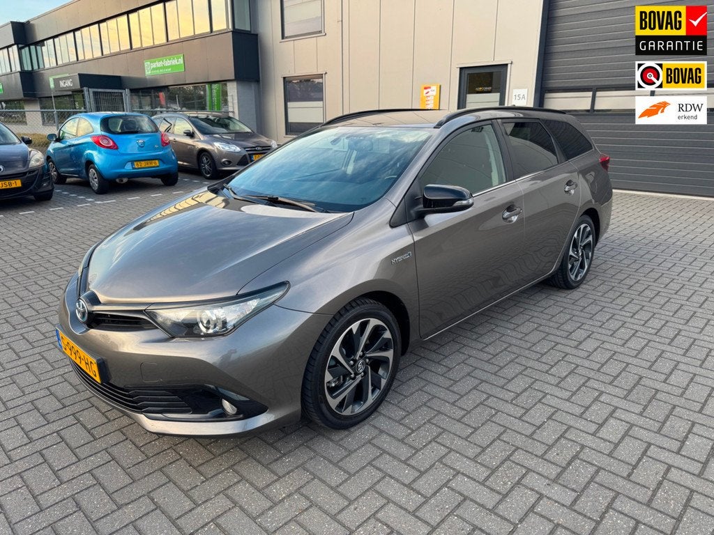 Toyota Auris Touring Sports 1.8 Hybrid Lease Exclusive, Auto's, Toyota, Bedrijf, Te koop, Auris, ABS, Achteruitrijcamera, Airbags