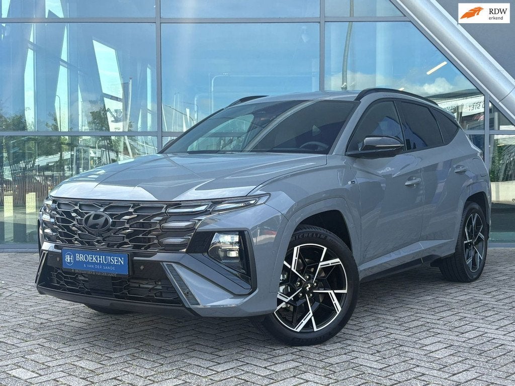 Hyundai Tucson 1.6 T-GDI PHEV N Line Sky 4WD 265pk FACELIFT, Auto's, Hyundai, Zwart, 4 cilinders, Adaptive Cruise Control, Bedrijf